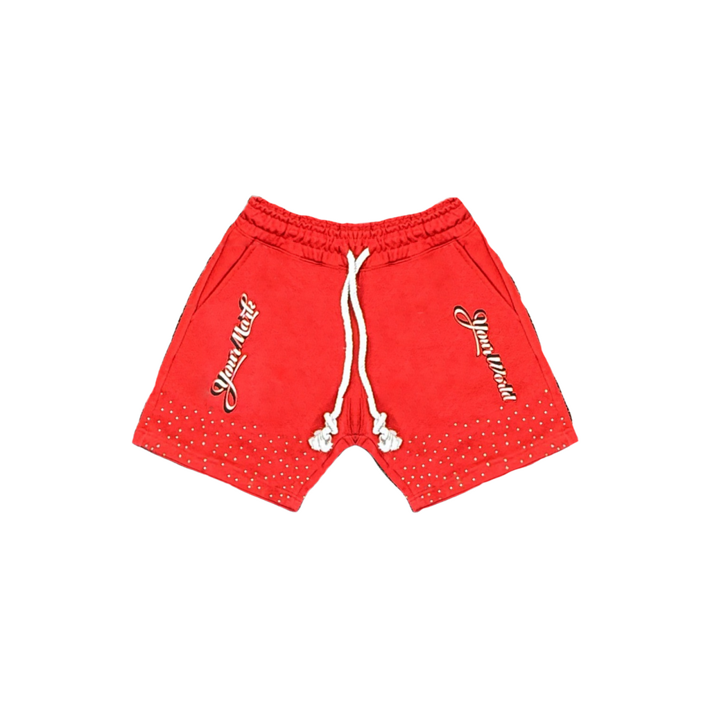 Red shorts with white drawstring and branding on a white background