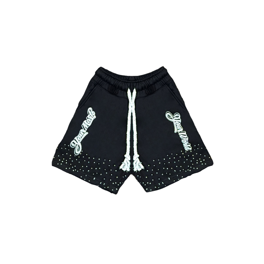 Black shorts with white drawstring and embellishments on a white background